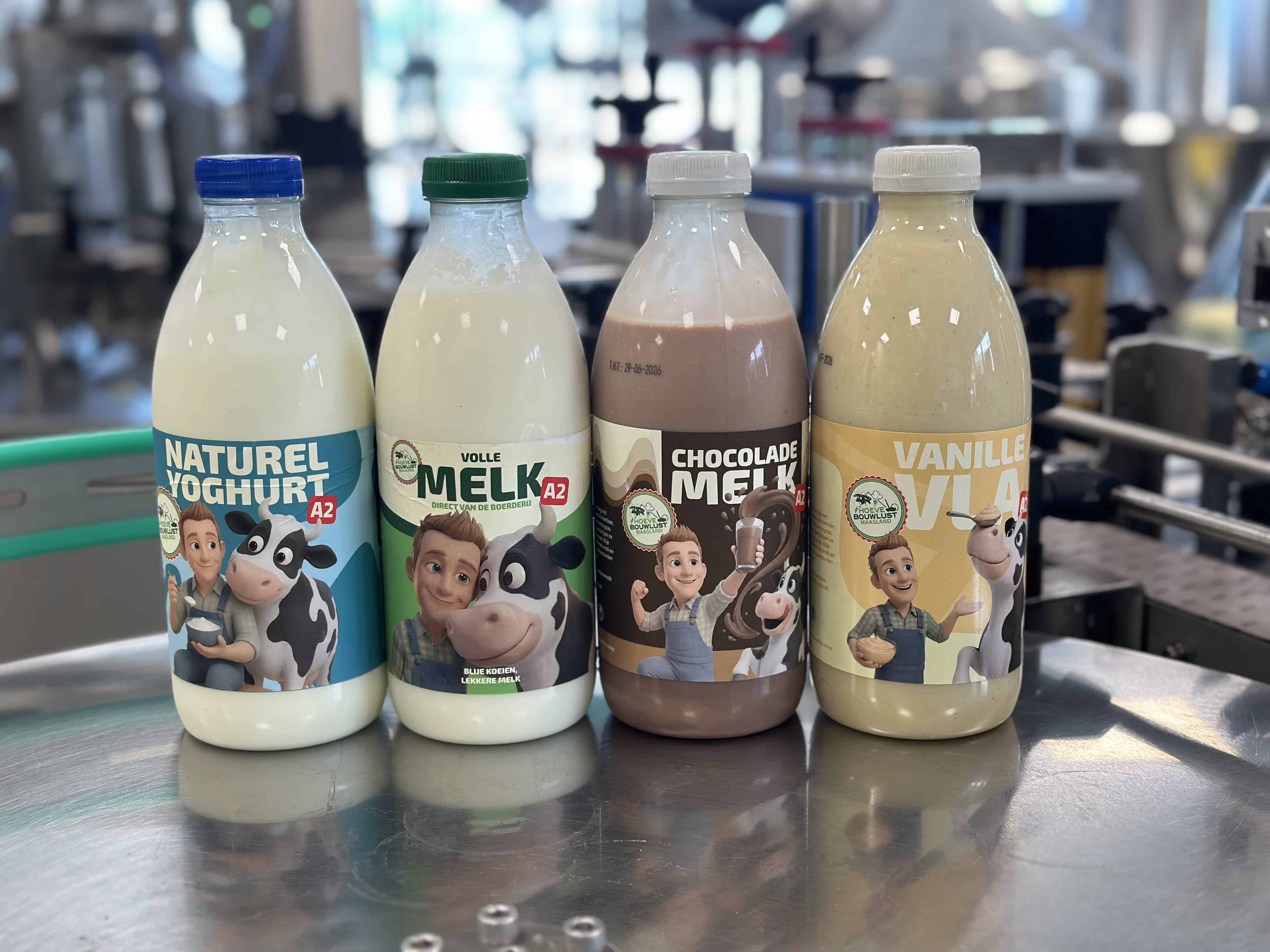 Vier flessen Boer Peter-zuivel: naturel yoghurt, volle melk, chocolademelk en vanillevla.